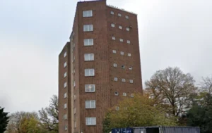 A-brick-Block-of-Flats-with-several-windows-visible