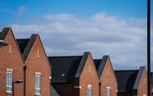 Houses-with-a-clear-sky-symbolizing-the-Short-Term-Housing-crisis