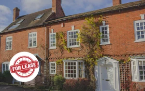 Red-brick-house-with-For-Lease-sign-highlighting-challenges-in-Children’s-Home-Leases