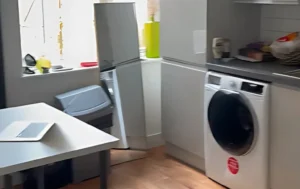 Kitchen-area-at-Douglas-Rd-Property-showing-appliances-and-a-workspace