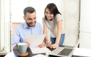 Couple-discussing-Guaranteed-Rental-Income-agreement