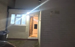 A-well-lit-property-entrance-highlighting-a-successful-Supported-Housing-Solution-in-place