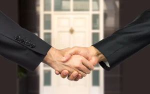 Property-Fund-Manager-sealing-deal-with-handshake-in-real-estate