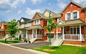 Street-with-several-brick-houses-highlighting-ideal-properties-for-Care-Homes-for-Lease-opportunities