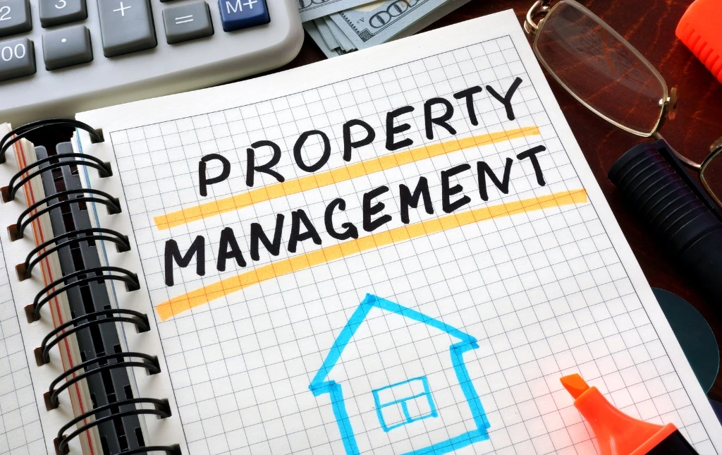 Property-management-notebook-with-drawing-and-office-supplies