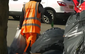 Birmingham-bin-strikes-worker-from-Birmingham-City-Council-collecting-garbage-bags