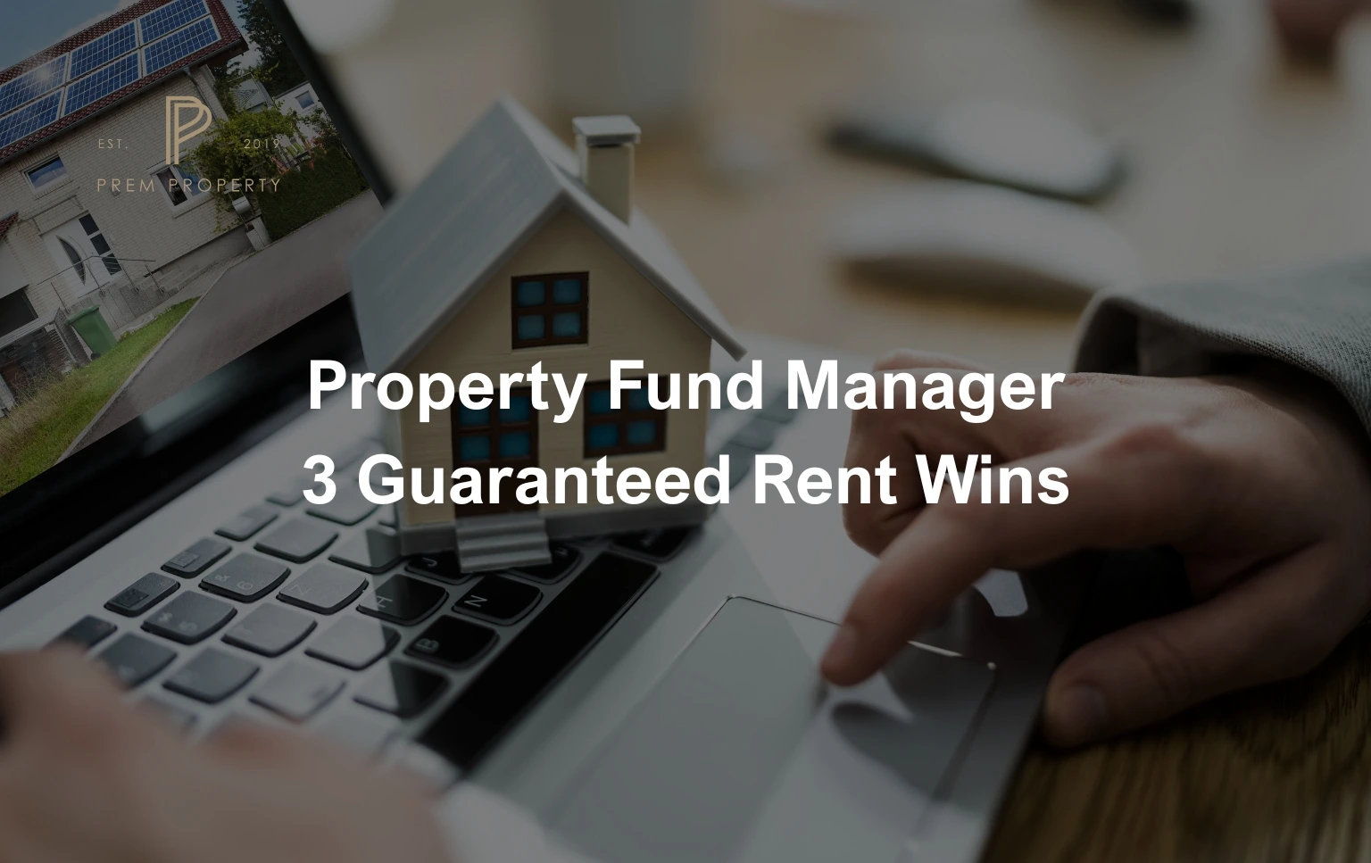 Property-Fund-Manager-with-a-laptop-showing-a-house-model-emphasizing-guaranteed-rent-wins-and-property-management-expertise