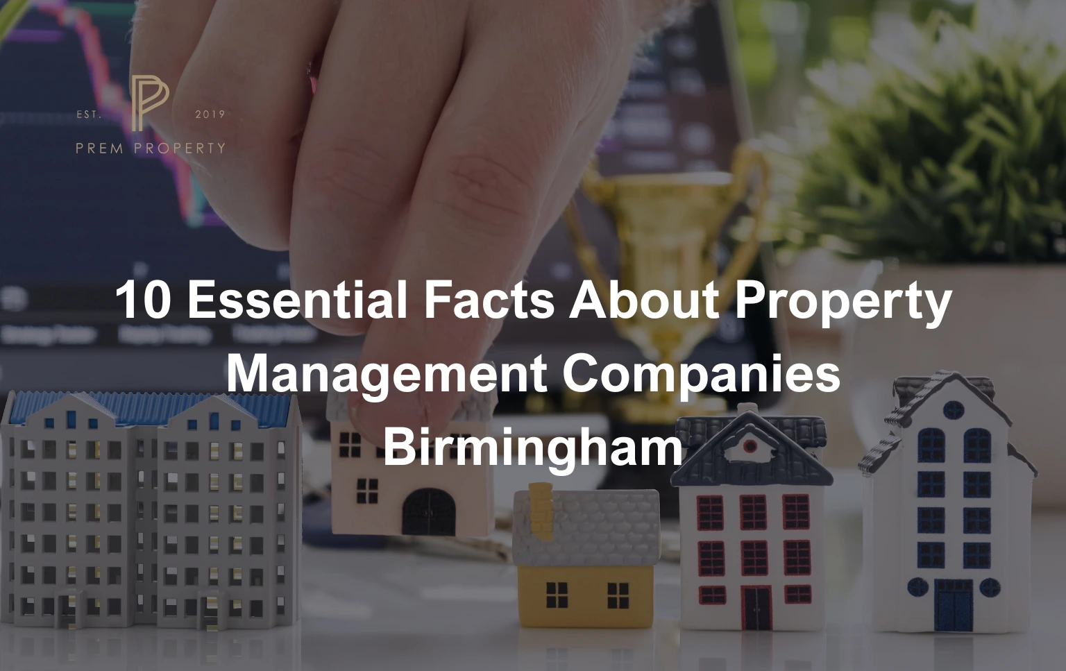 Property-Management-Companies-Birmingham-miniature-houses-with-financial-graph-background