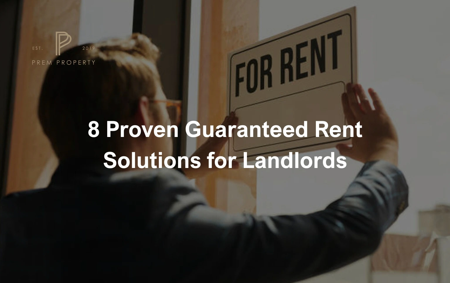 Man-placing-a-For-Rent-sign-with-the-text-8-Proven-Guaranteed-Rent-Solutions-for-Landlords