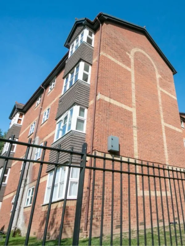 C2-Conversions-Residential-building-with-fence